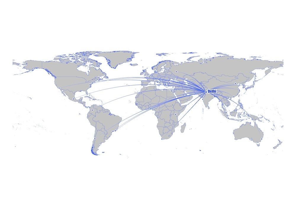 The map highlights Delhi, India, and its connections to major cities around the world. As Delhi Airport becomes the first in India to achieve Net-Zero Carbon Emission status, it reinforces its role as a global aviation hub committed to sustainability.